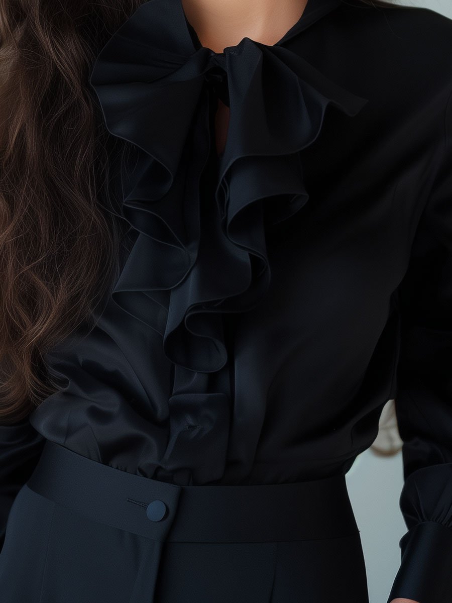 Chic Black Blouse Featuring Dramatic Ruffles