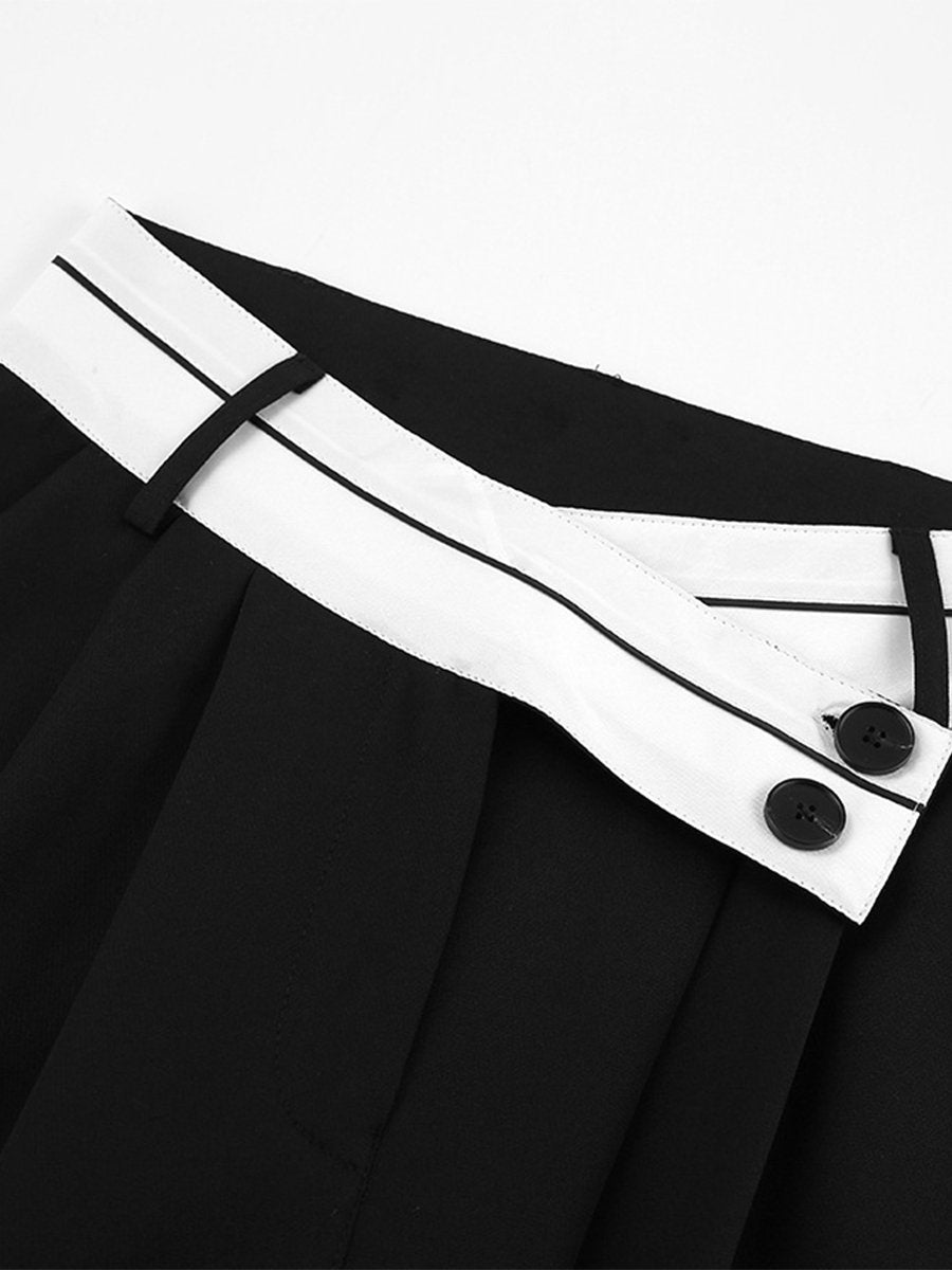 Chic Contrast: High-Waisted Black and White Wide-Leg Pants